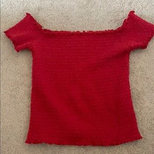 Red off shoulder shirt